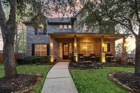 Front exterior of a two story home in Eagle Springs, Humble, Texas