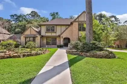 Front exterior of a two story home in Bear Branch Village, Kingwood, Texas
